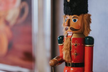 shallow-focus-photography-of-wooden-nutcracker-1697234
