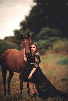 photo-of-woman-wearing-black-dress-beside-horse-2090704